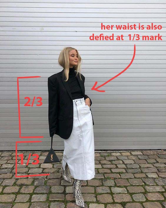 how to dress using the golden ratio, 2/3rds on top and 1/3 on the bottom with her waist defined. girl wearing a turtlenck tucked into long skirt and blazer over