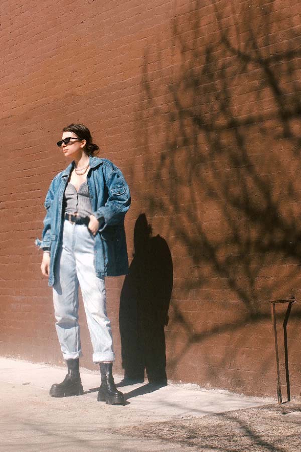 jeans outfit for spring with cardigan and denim jacket and chunky boots