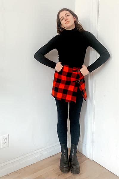 how to style a turtleneck with a mini skirt, black tights and boots