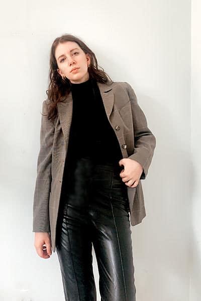 turtleneck with blazer outfit, business casual outfit including fitted black turtleneck, oversized blazer, and loose fitting leather pants