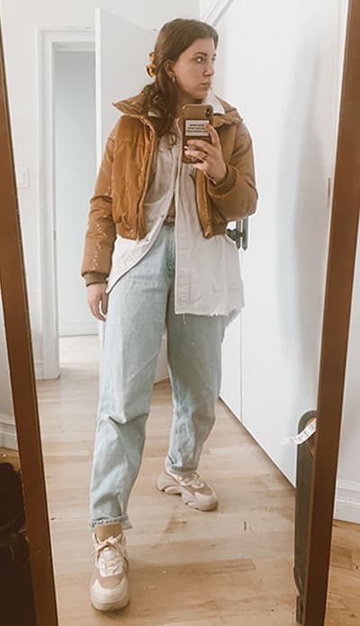 brown color trend, tan puffer with shacket and jeans on gabrielle arruda
