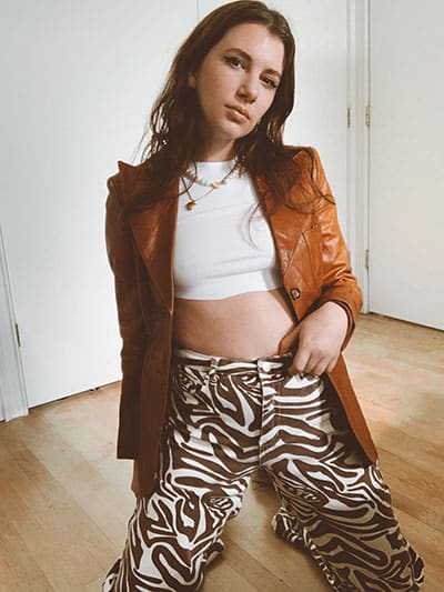 brown fashion trend with caramel cognac brown leather jacket and brown zebra print pants