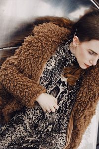 how to wear brown, add some texture with a brown fuzzy coat or sweater. Fuzzy brown coat and snakeskin print dress on style blogger gabrielle arruda 