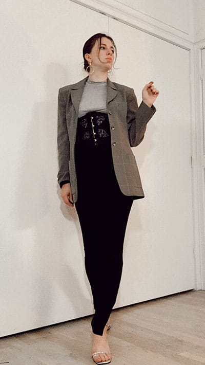bella hadid style inspiration on style blogger gabrielle arruda. split ankle pants, half corset with tee underneath and fitted blazer, square toe heels and circle statement earrings