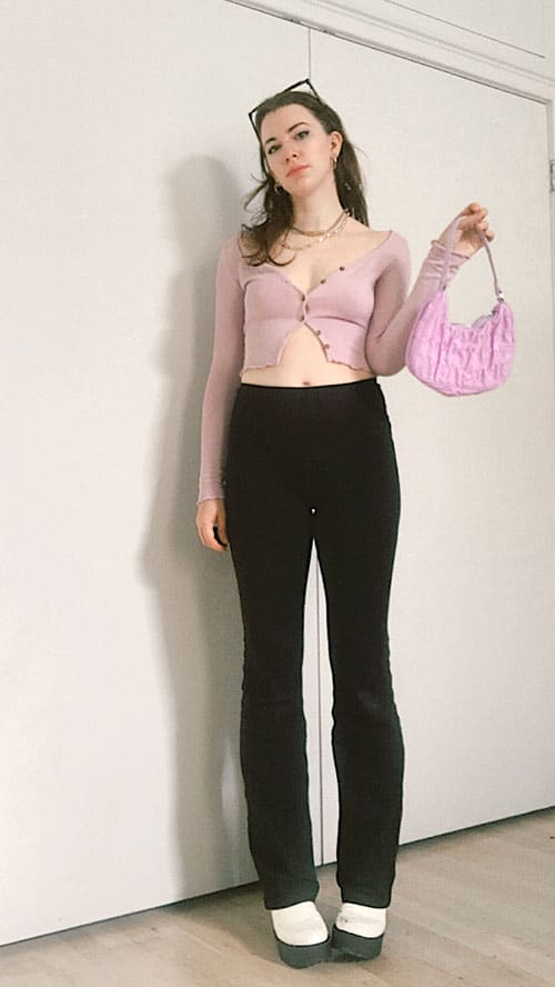 black flare leggings with cropped cardigan and lilac 90s bag and platform white boots