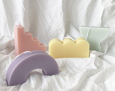 mixed shape candles, cool shaped candles, pastel arc candle, step candle