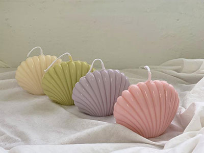 cool unique candle, seashell shaped candles in pastel colors