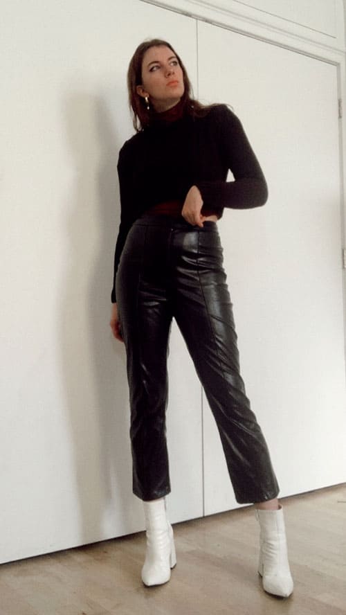 leather pants outfit idea for work. leather pants with heeled boots and structure sweater.