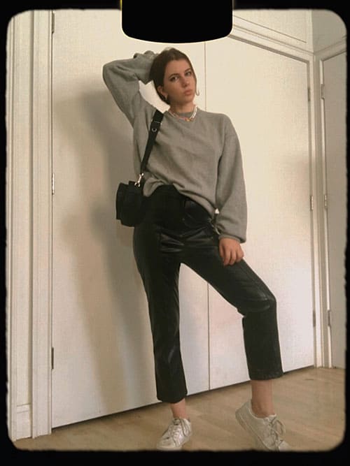 leather pants with sweatshirt and sneakers. leather pants outfit idea for the weekends