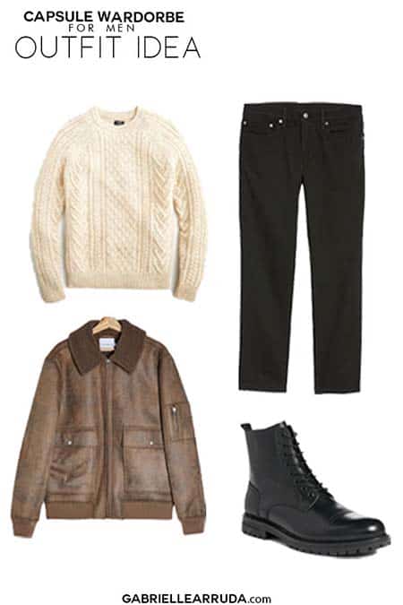 men's capsule wardrobe outfit idea with slim cut black jeans, cream fisherman sweater, lace up leather boots and brown leather bomber