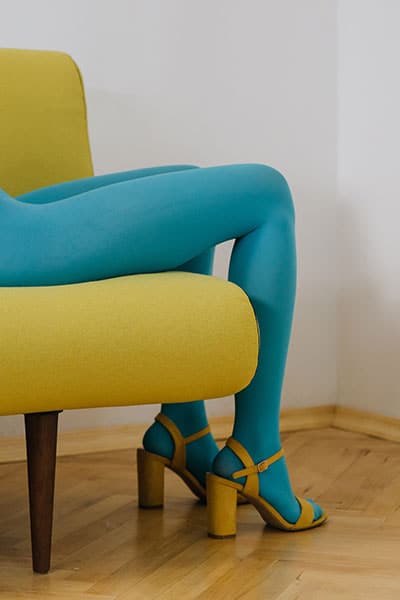 spring fashion trends 2021, colorful tights. turquoise blue tights with yellow heels