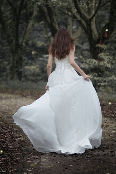 spring fashion trends 2021 royalty aesthetic, girl running in forest in ballgown