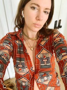 gabrielle arruda in vintage shirt with layering gold necklaces