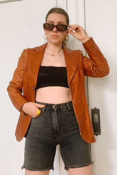 long denim short outfit idea with trendy item fitted leather blazer and rectangular sunglasses and crop top
