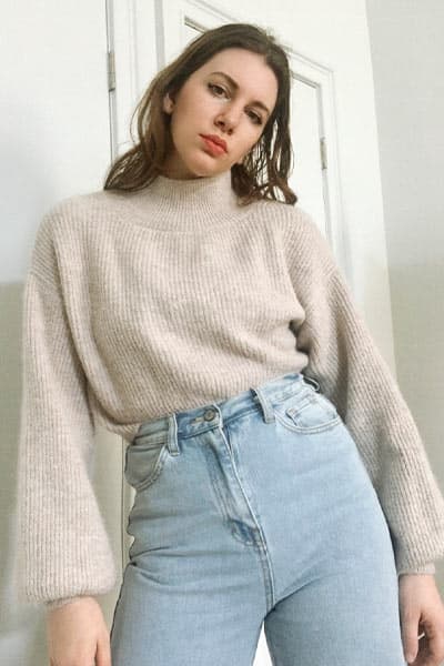 mini french tuck with sweater, lightly tucked into jeans 