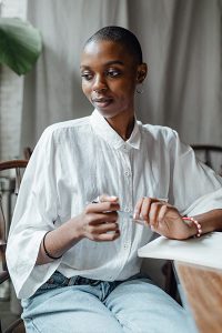 french tuck on model with jeans and light weight white shirt