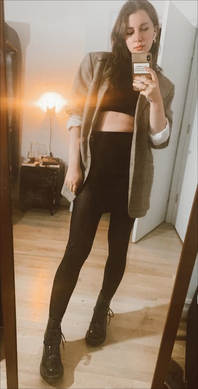 first date outfit idea, skirt with tights, cropped top, boxy blazer and combat boots