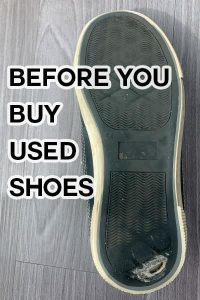 before you buy used shoes, image of used tennis shoe with hole in sole. 