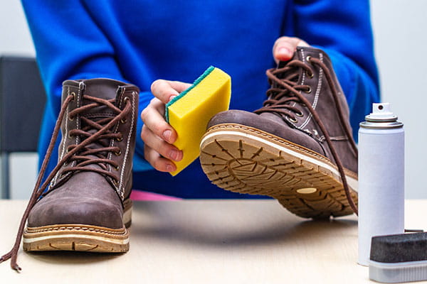 how to hand wash used leather boots with sponge