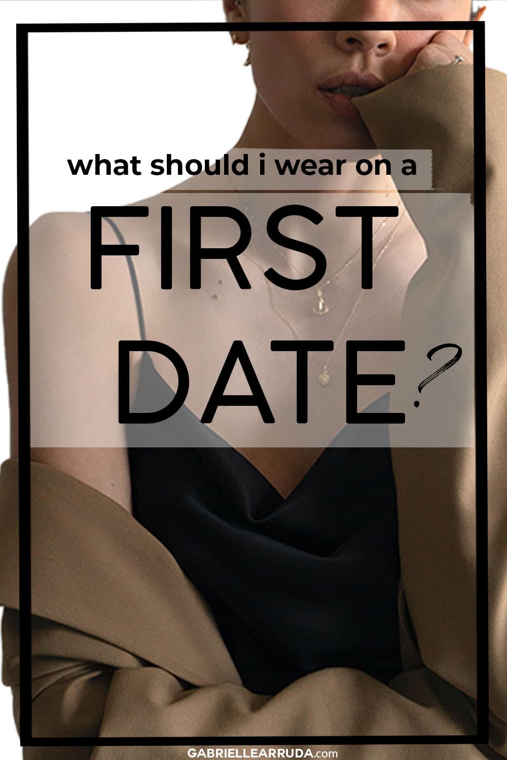 what should i wear on a first date? girl in black camisole with trench coat and simple gold necklace