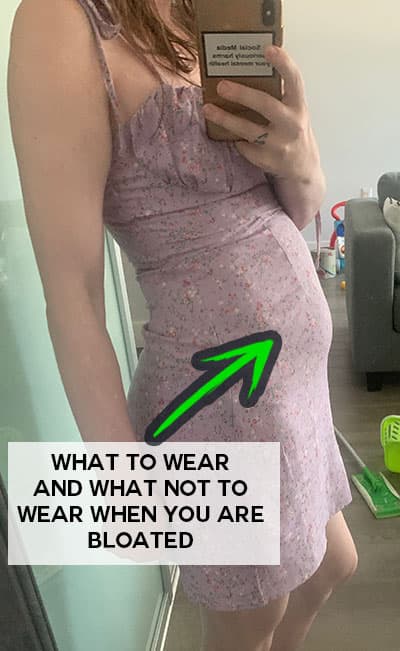 what not to wear when you're bloated- fitted camisole dress with stomach seams that cling to bloated belly and feel tight