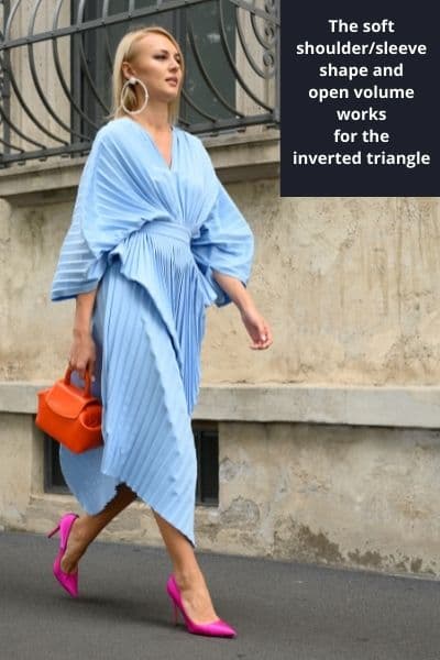 nyfw style icon wearing dolman sleeve blue dress to balance out inverted triangle shoulder