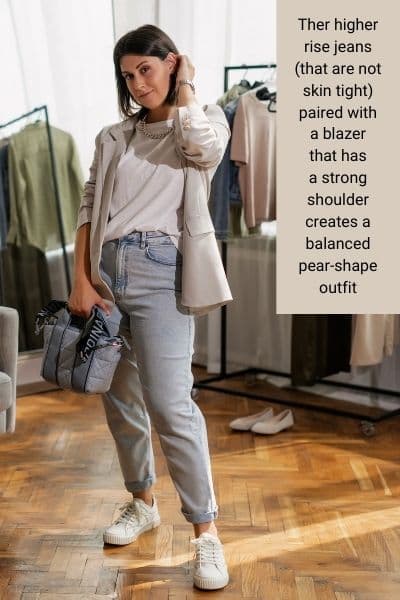 pear shape body outfit with jeans and padded shoulder blazer