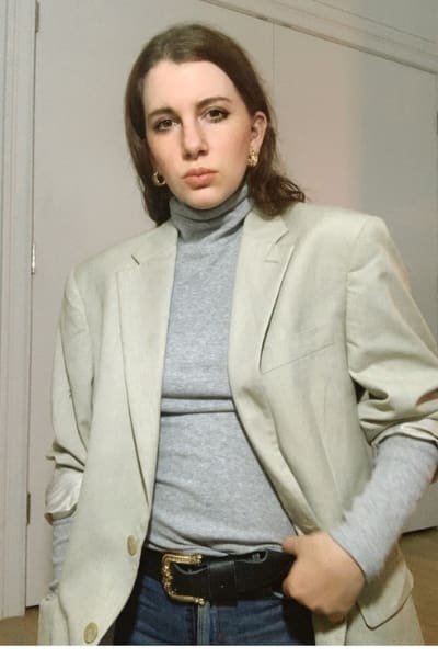 gabrielle arruda wearing wool blend blazer for fall capsule wardrobe with turtleneck