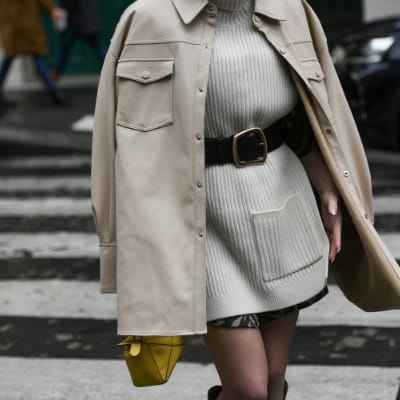 woman wearing belted sweater with khaki colored shaket over, how to look your best and feel your best in clothes 