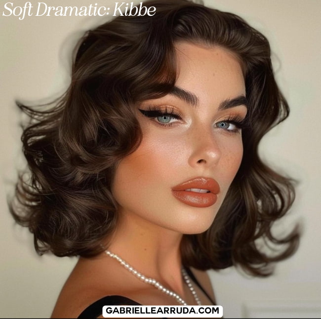 kibbe soft dramatic hairstyles woman with voluminous hair and glam makeup