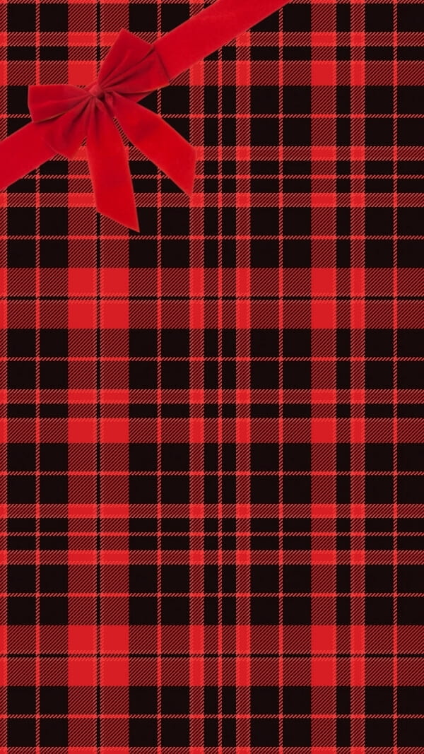 red plaid fabric with red bow in corner, holiday wallpaper for phone