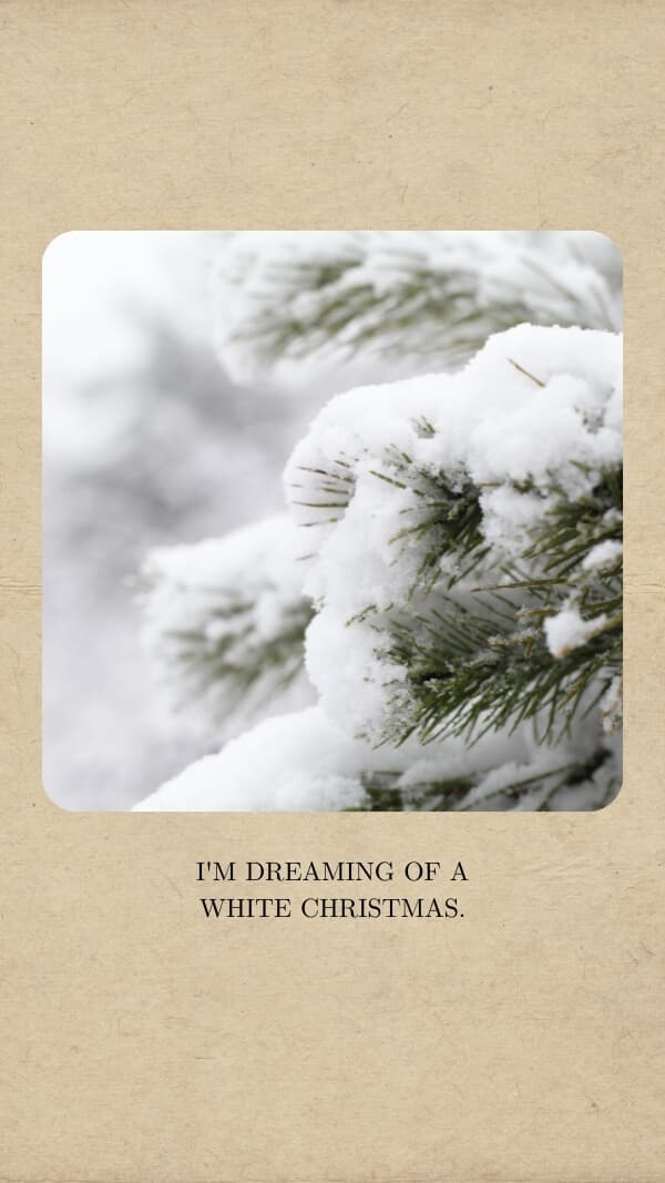 image frame with tan background and rounded edge photo of snow on evergreen tree with text "i'm dreaming of a white christmas" 