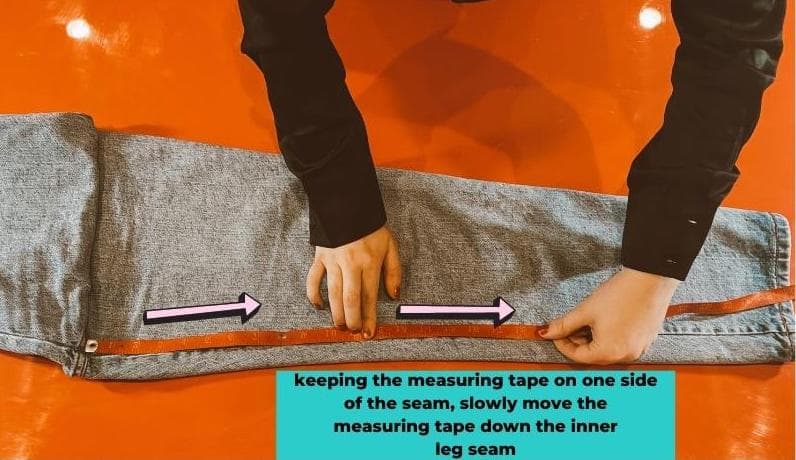keeping the measuring tape on one size of the seam, move  the tape measure down the inner seam image (the top should be anchored 
