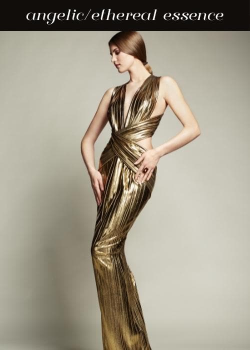 woman wearing long gold gown that drapes down body with cut outs at neckline to show angelic ethereal essence