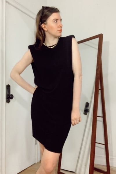gabrielle arruda in a moderate weight black dress 