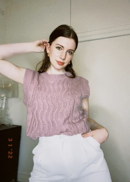 gabrielle arruda wearing spring lilac sweater vest for spring capsule 2022